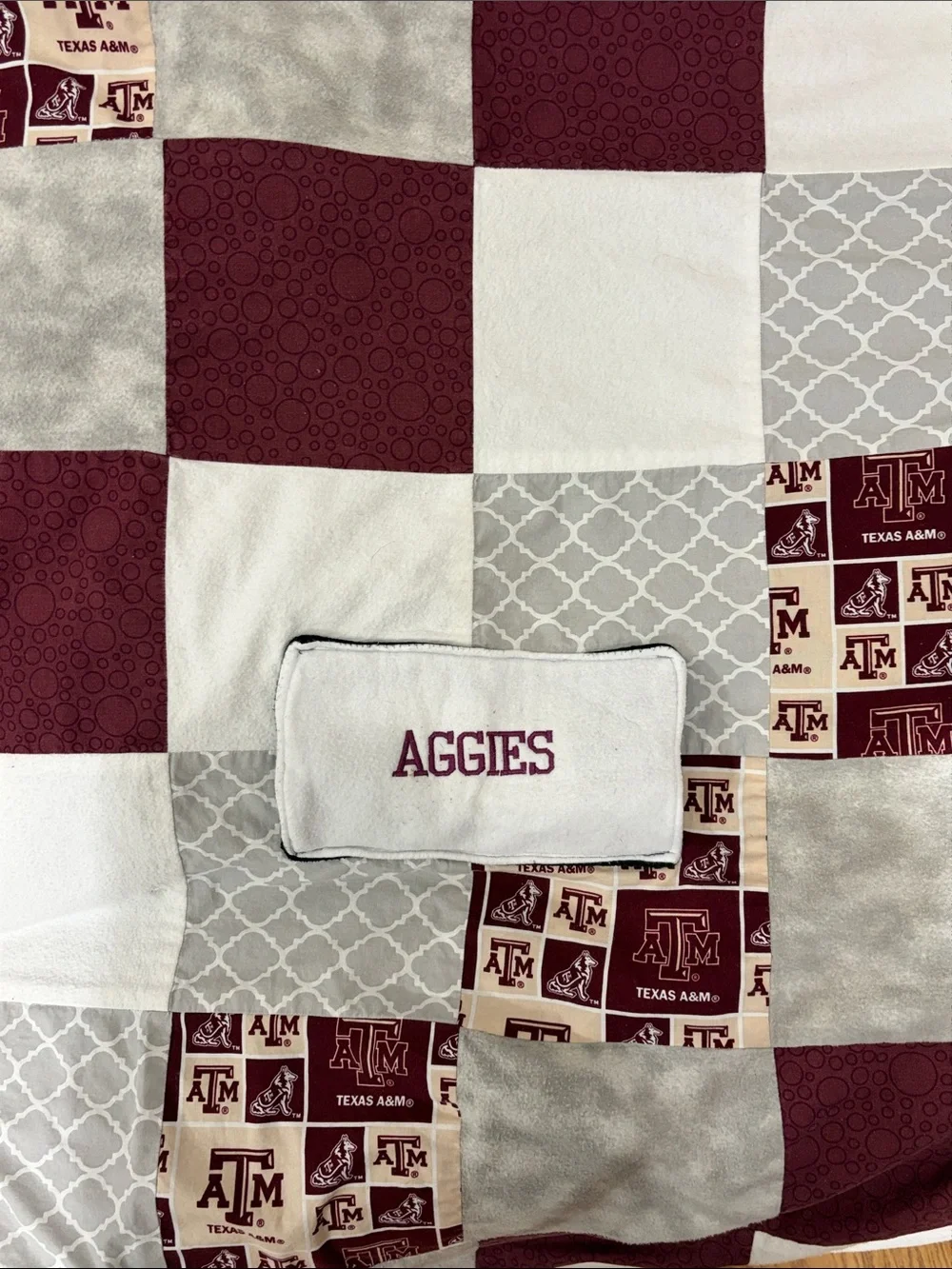 Texas A&M Aggies Patchwork Throw Blanket - Maroon & White Hand Pocket in front